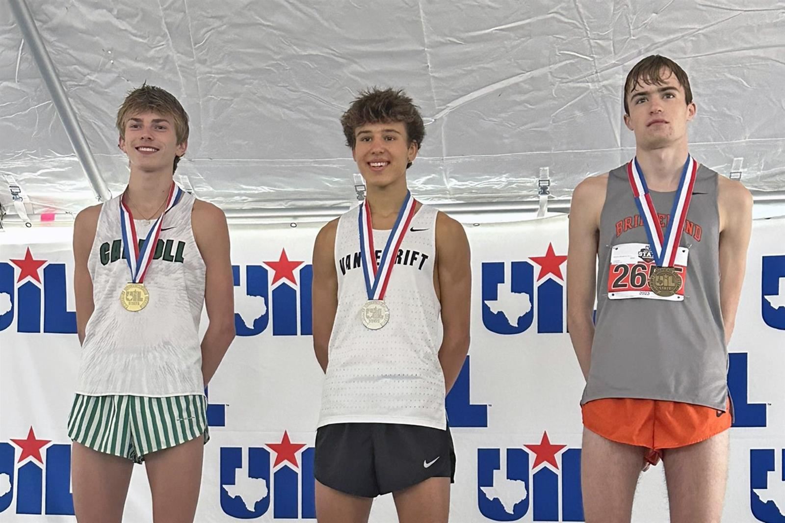Bridgeland junior Benjamin Montgomery, right, placed third overall with a time of 15:06.70 at the UIL State.